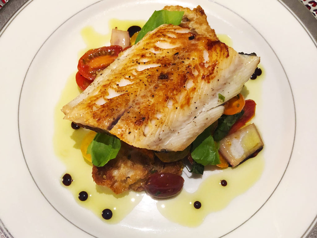 Thyme Crusted Sablefish served on a refreshing Panzanella Salad